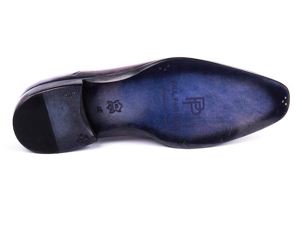 A pair of Paul Parkman Cap Toe Oxfords in gray burnished leather, showcasing a classic cap toe design and black laces, displayed side by side and viewed from the front.