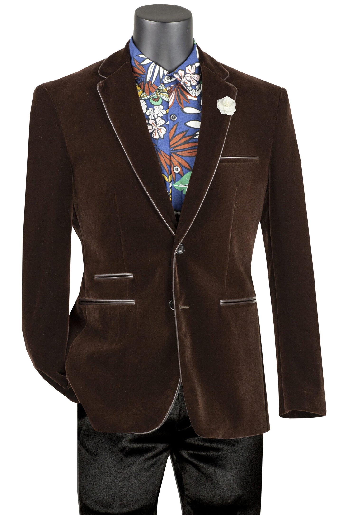 A mannequin showcases the Vinci Suits Slim Fit Velvet Sport Coat (Brown) BS-02, paired with a floral shirt, black pants, and adorned with a white boutonnière on the lapel.