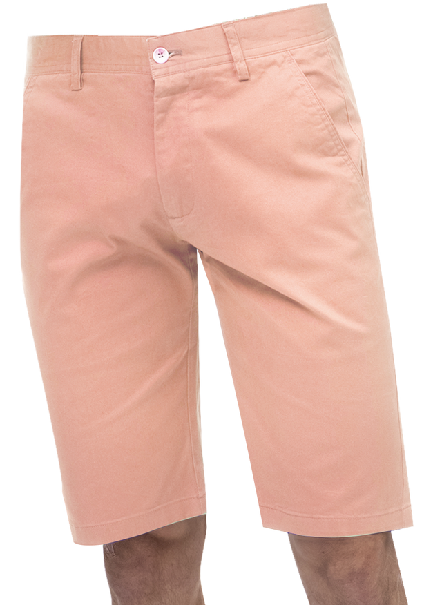 A man wearing the EJ Samuel Pink Chino Short Pants CHS01 by EJ SAMUEL, his hands tucked casually in the pockets, stands against a plain white background.
