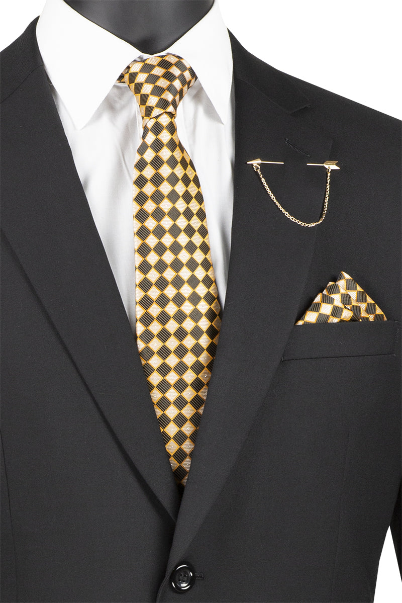 The mannequin displays a Vinci Suits 2 Piece Suit with 2" Adjustable Waist Band in black, featuring a white shirt, gold checkered tie, and matching pocket square. The chain accessory complements the wool feel of the fabric, while the notch lapel completes the sophisticated look.