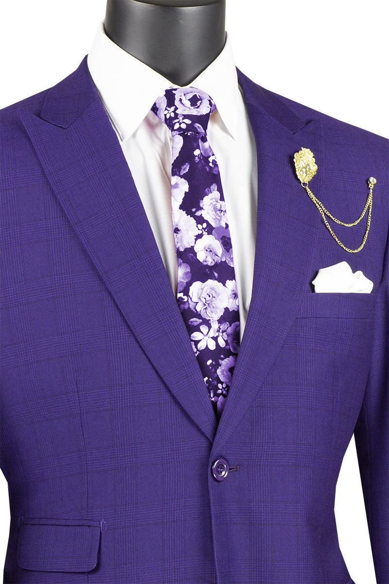 A mannequin wears a Vinci Suits Modern Fit 2 Piece Windowpane Suit (Purple) MRW-1 with a floral tie, white shirt, gold chain lapel pin, and pocket square.