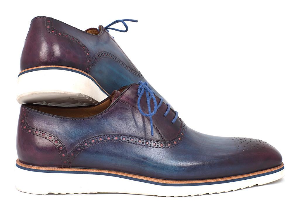 Introducing the Paul Parkman Smart Casual Oxford Shoes Blue & Purple - 184SNK-BLU: A stylish pair of blue leather brogues from Paul Parkman, featuring purple accents, blue laces, and distinctive white soles, perfect for elevating your smart casual look.