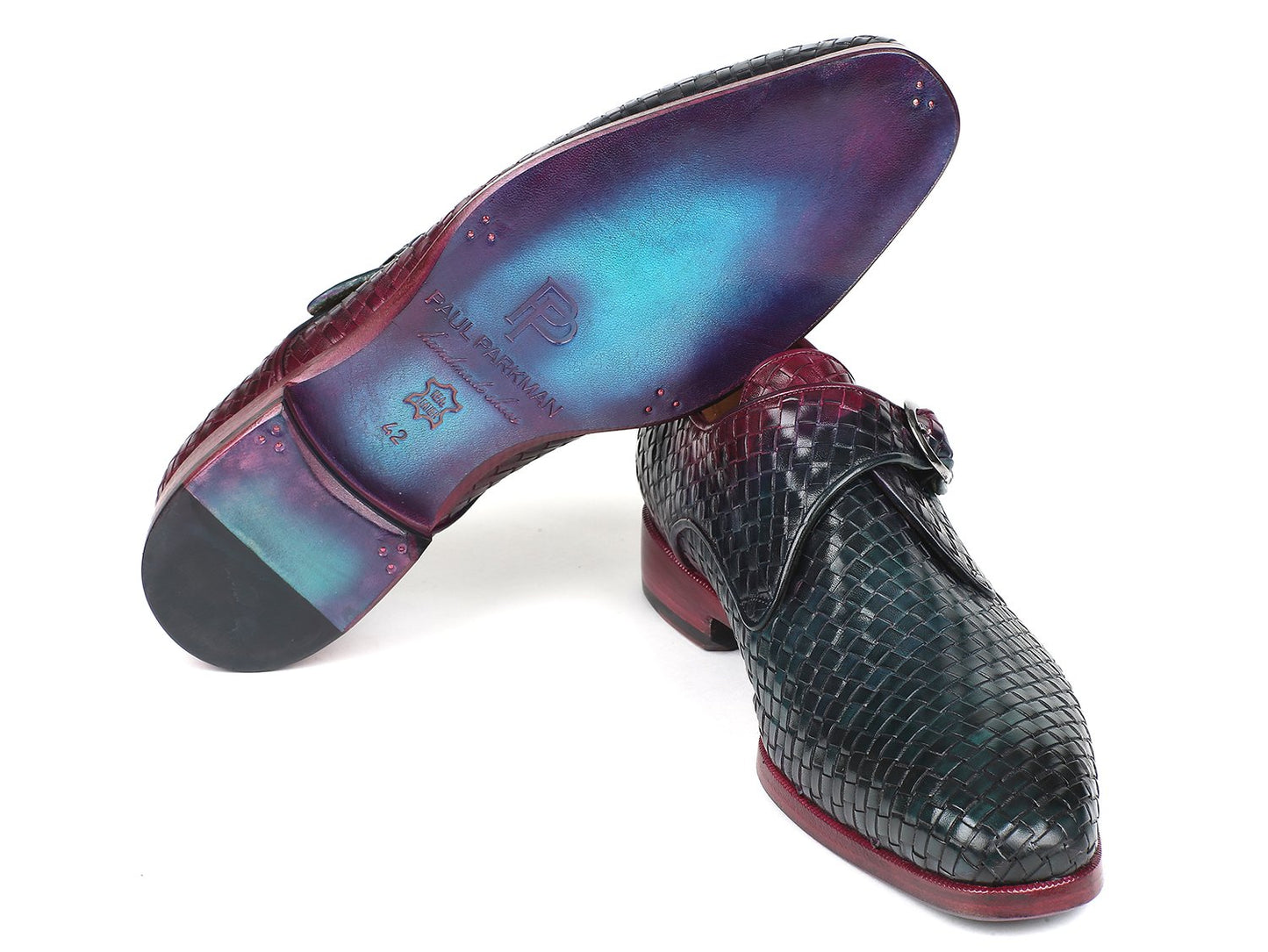Introducing the Paul Parkman Purple & Green Woven Leather Single Monkstraps, a pair of handmade shoes from Paul Parkman featuring a bold combination of green and burgundy leather with red soles.
