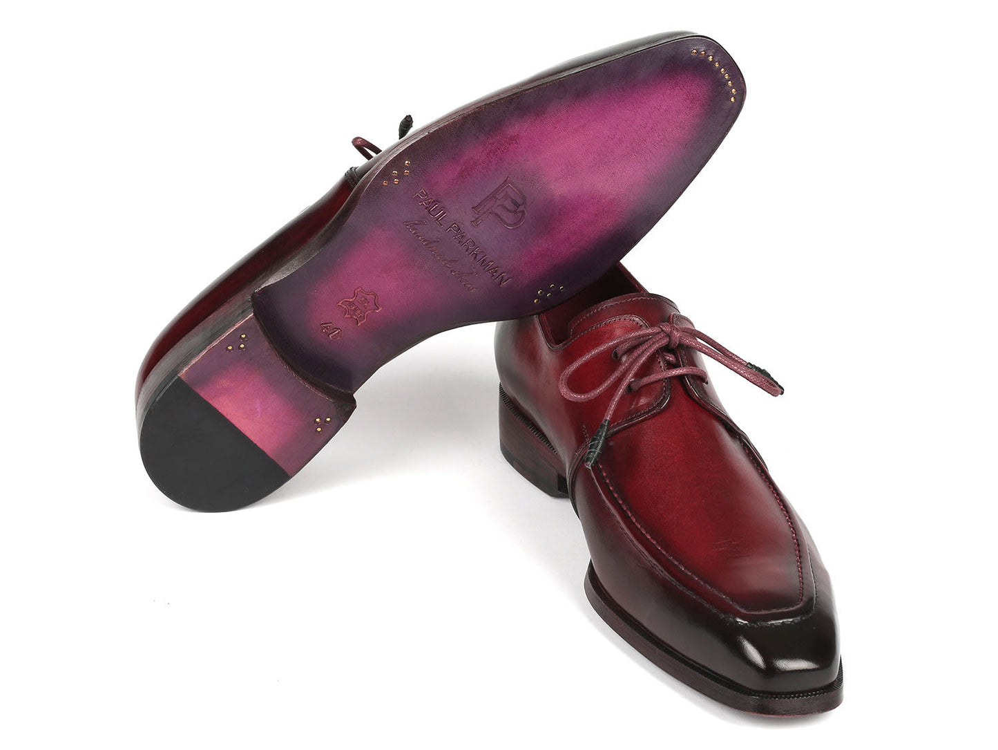 The Paul Parkman Bordeaux Leather Apron Derby Shoes - 13BRD92, crafted from hand-painted calfskin with laces and featuring a subtle shine and darkened toe caps, are set against a plain background.
