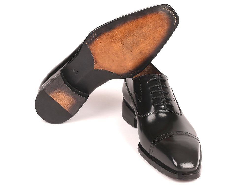 The Paul Parkman Goodyear Welted Cap Toe Oxfords in black polished leather (Model: 056BLK84) are showcased on a white background, featuring a shiny finish and intricate lace design.