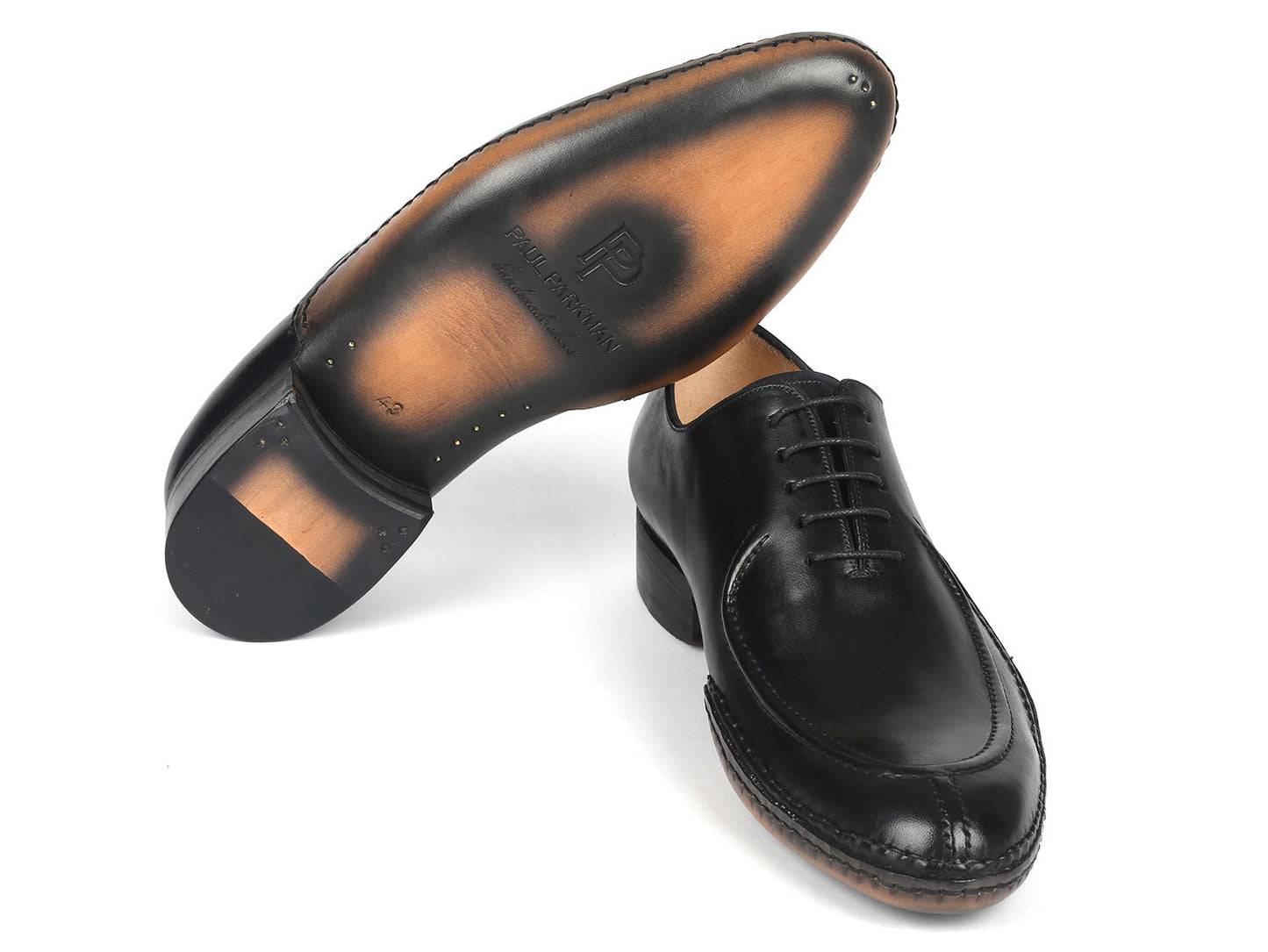 The Paul Parkman Opanka Stitched Men's Split-Toe Black Leather Oxford Shoes - 054-BLK, from the brand Paul Parkman, are crafted from hand-painted black leather and feature elegant laces, displayed against a pristine white background.
