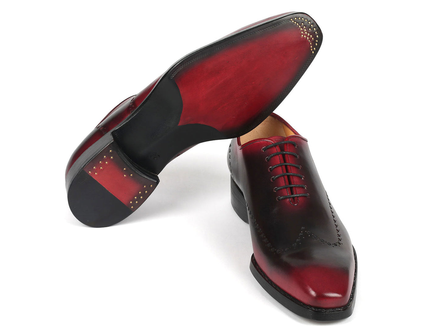 A pair of Paul Parkman Goodyear Welted Red & Black Oxford Shoes - 081-B51, featuring decorative perforations and black laces, crafted with Goodyear welted soles.