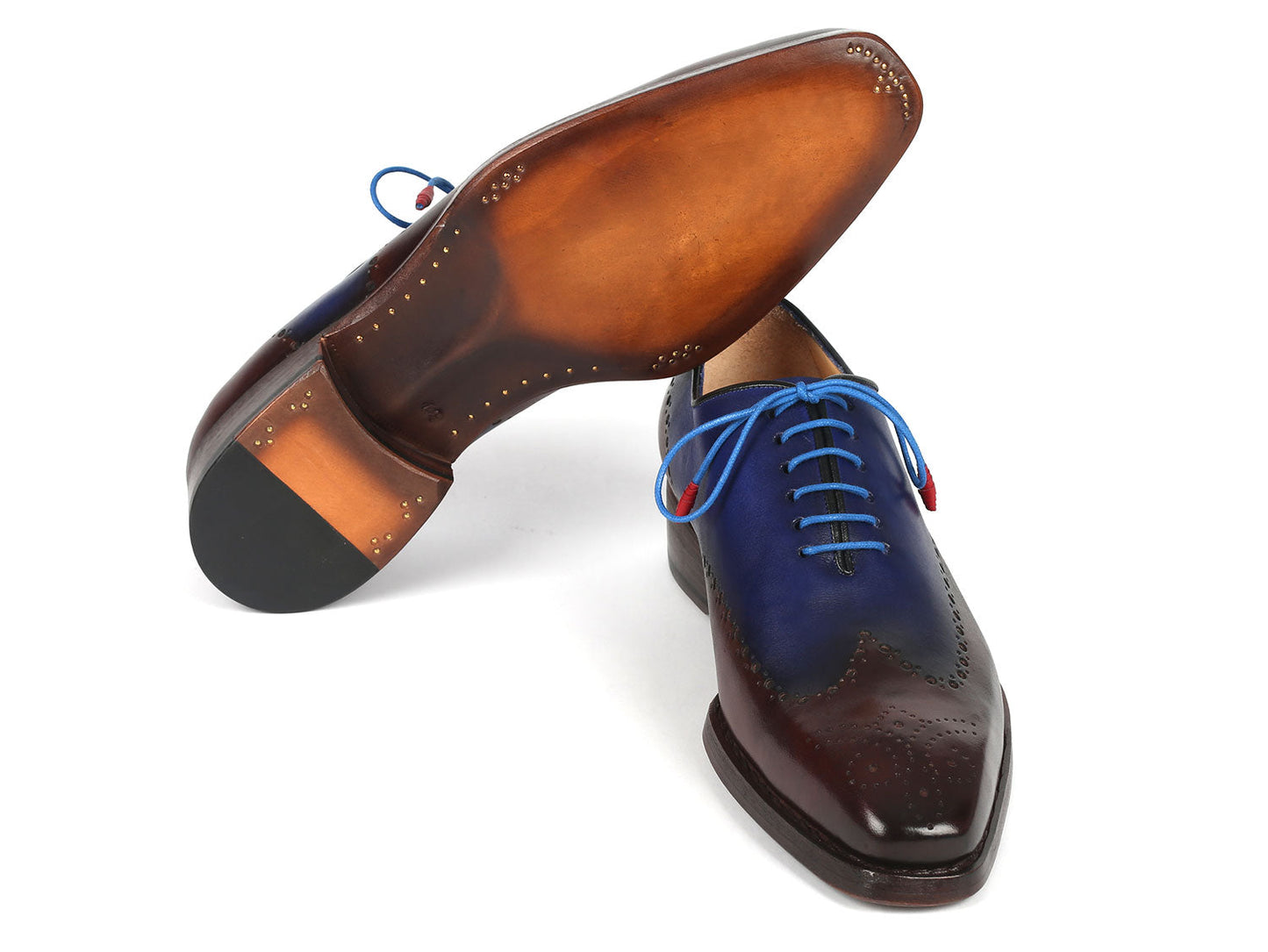 Introducing the Paul Parkman Goodyear Welted Brown & Blue Oxford Shoes - 081-B35, a pair of men's handmade leather shoes featuring perforated detailing. These exquisite brogues come with blue laces and red aglets, meticulously crafted using the renowned Goodyear welted construction for enduring durability.