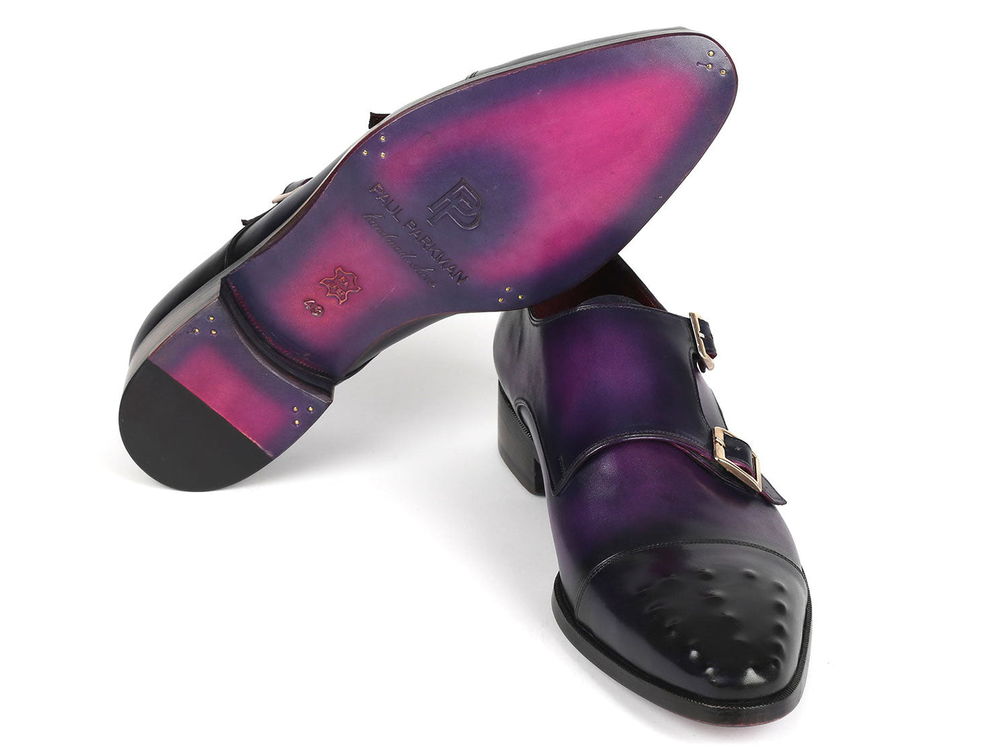 The Paul Parkman Studded Cap Toe Monkstraps Purple - 047-PRP are a pair of men's dress shoes crafted by the brand Paul Parkman. They showcase a purple gradient design, black capped toes, and feature double monk straps in hand-painted leather with a polished finish.