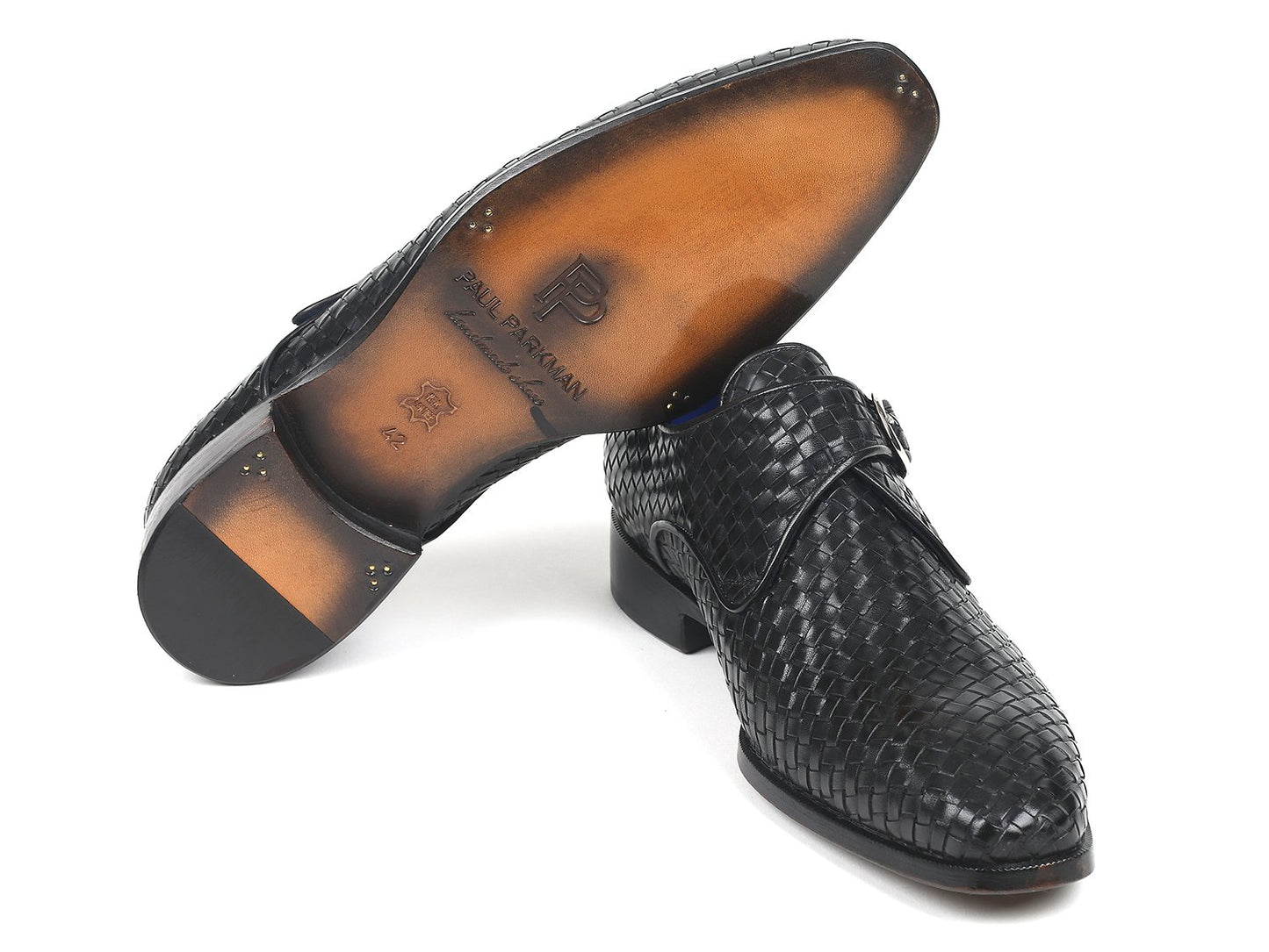 The Paul Parkman Black Woven Leather Single Monkstraps (011WN95) are beautifully showcased on a white background, featuring a striking blue inner lining.