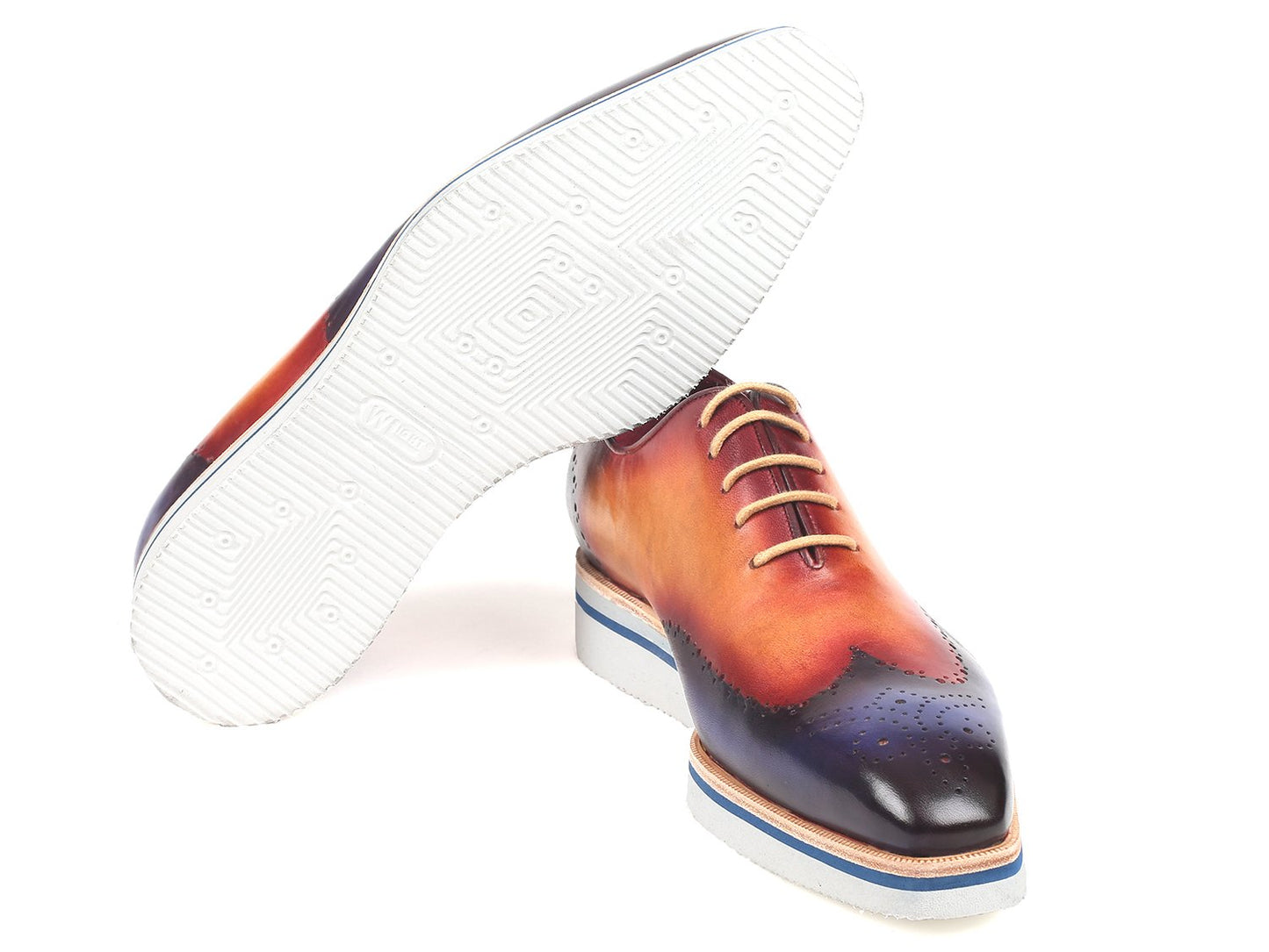 Experience style and sophistication with the Paul Parkman Smart Casual Wingtip Oxfords in Blue & Camel (188-BLU-CML). These multicolored shoes boast handpainted uppers featuring a stunning gradient design transitioning from orange to purple. They are complemented by wingtip leather lining, white soles, and tan laces for a unique, fashionable look.