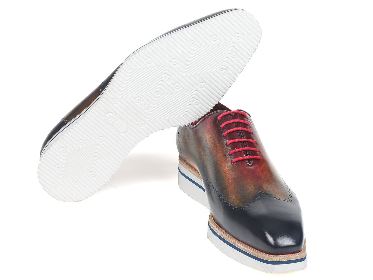 Experience the Paul Parkman Smart Casual Wingtip Oxfords Multicolor (187-MIX-NVY), expertly crafted with hand-painted, multicolored leather. These polished shoes feature striking red laces and blue-striped soles, making them perfect for smart casual occasions. Brought to you by the renowned brand, Paul Parkman.