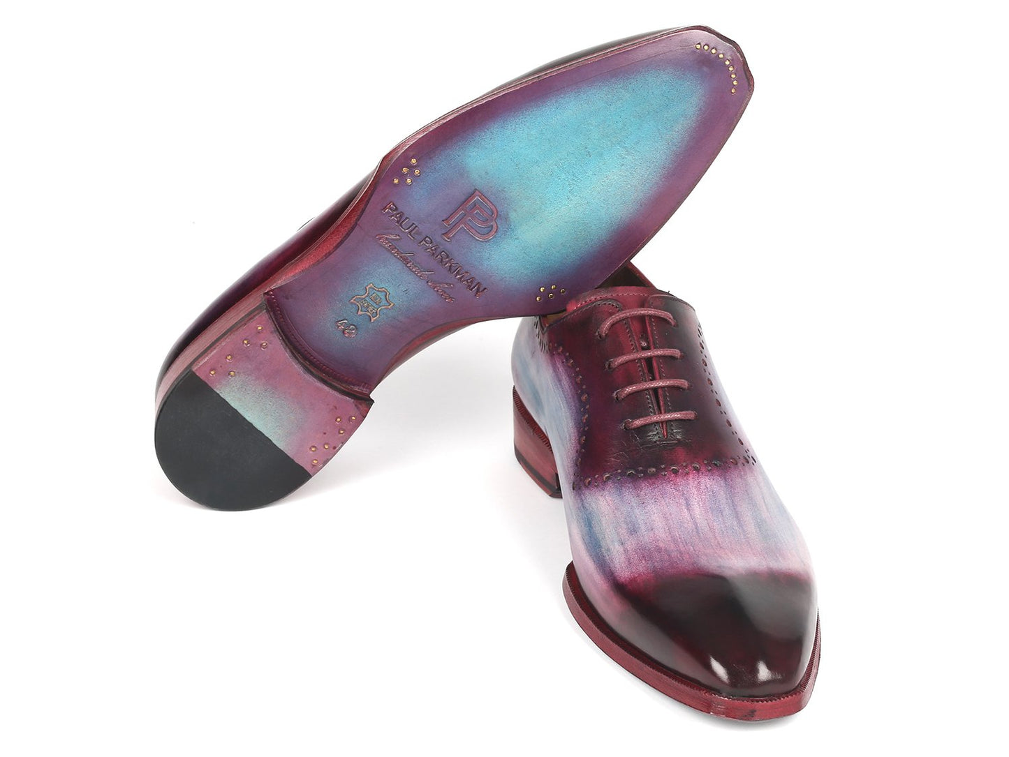 Paul Parkman introduces the Blue & Purple Oxfords (AG446PBL) for men, featuring a polished finish with a sculpted toe, gradient shades of burgundy and blue, hand-painted leather craftsmanship, laces, and decorative perforations.