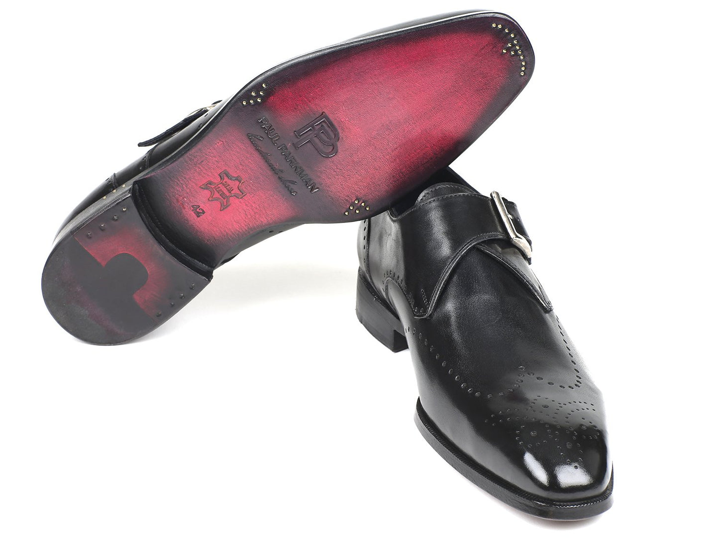Introducing the Paul Parkman Wingtip Single Monkstraps Black - 98F54-BLK, a pair of polished black leather shoes featuring decorative wingtip perforations.