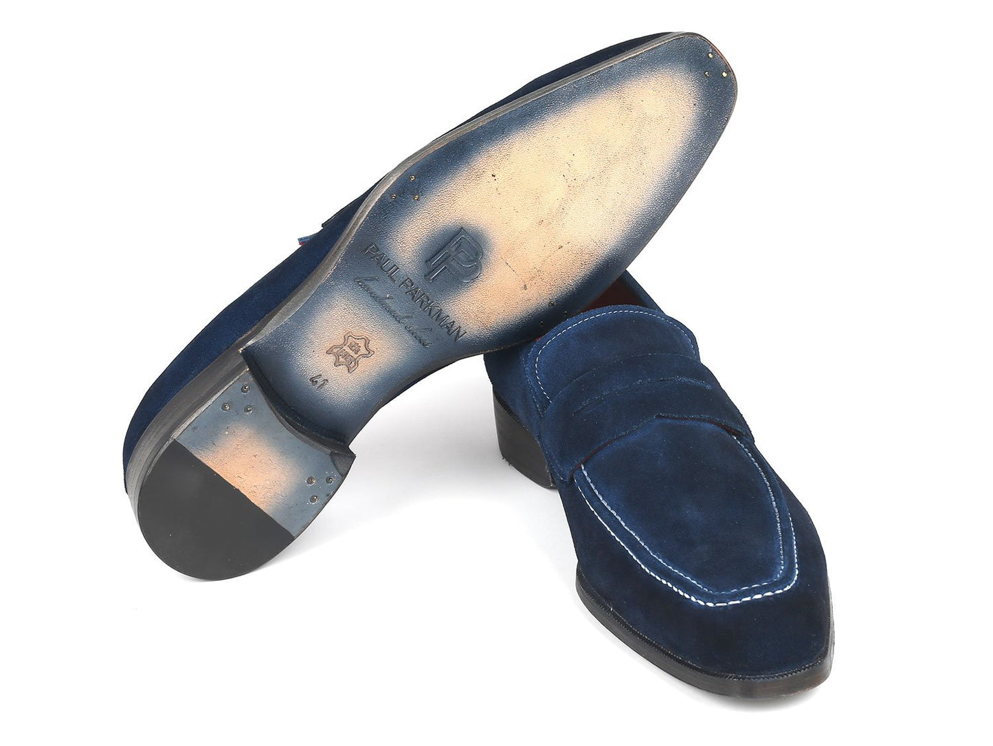 Featuring a white background, the Paul Parkman Penny Loafers Navy Suede - 10SD21 are made-to-order men's slip-on shoes with red interior detailing, making them a stylish choice.