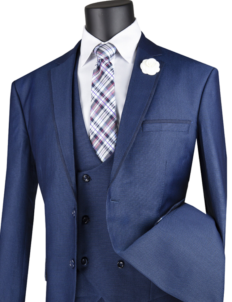 The Vinci Suits Modern Fit 3 Piece Suit MV2B-1 in Navy features a birdseye pattern, matching vest, checkered tie, and a white flower lapel pin for added sophistication.