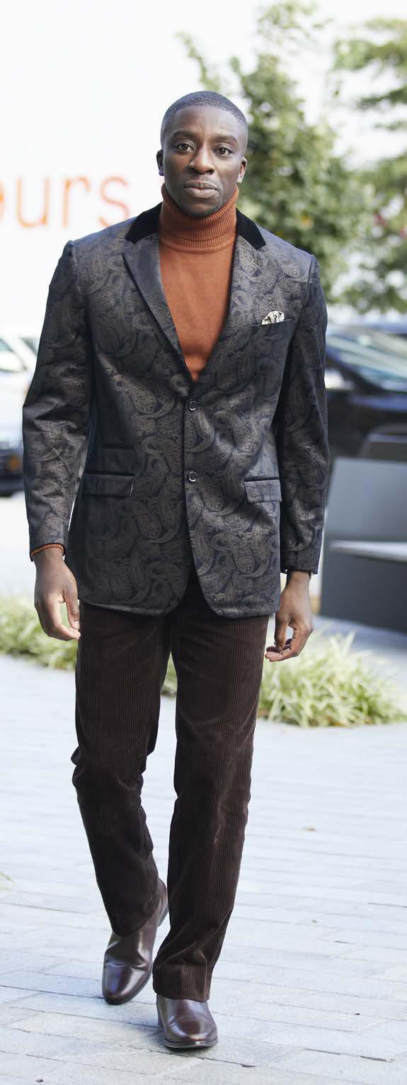 Close-up of Inserch Cotton Flat Front Corduroy Pants P3103-155 in Winter White, showcasing a ribbed fabric with diagonal lines that create a textured pattern, which is reminiscent of the sleek, modern fit seen in corduroy designs.