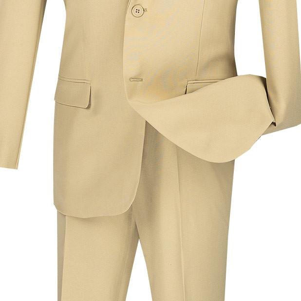 The mannequin's look showcases Vinci Suits' Slim Fit 2 Piece 2 Button Business Suit (Beige) S-2PP, paired with a plaid tie and brown shirt. This wrinkle-resistant suit blends sophistication and modern flair, ideal for a stylish business appearance.