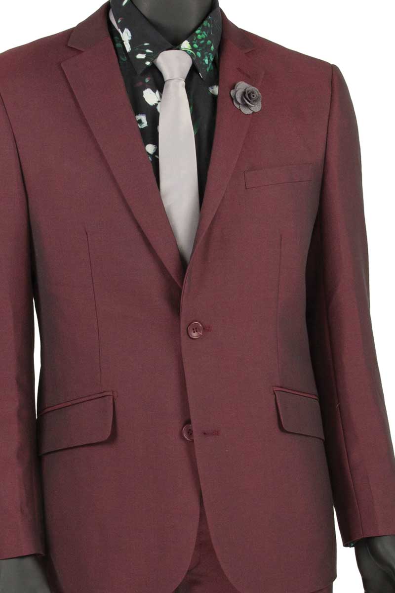 The mannequin showcases a Vinci Suits Slim Fit 2 Piece Suit in wrinkle-resistant burgundy (S2RK-7), paired with a floral shirt, gray tie, and a flower pin on the lapel.