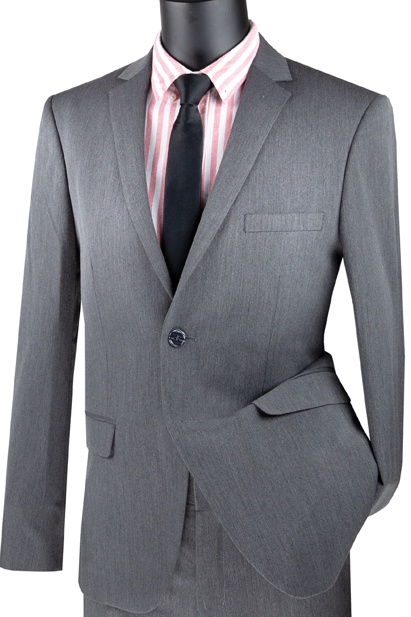 The mannequin displays the Vinci Suits Ultra Slim Fit Stretch Wool Feel Suit in charcoal, paired with a pink and white striped shirt and a black tie.
