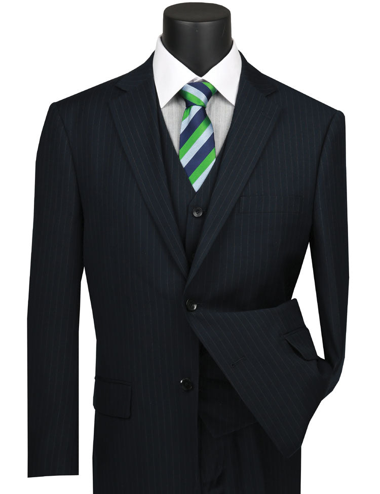 A navy tone-on-tone stripe three-piece suit by Vinci Suits with a white shirt and green-striped tie is displayed on a mannequin, highlighting timeless elegance in a regular fit.