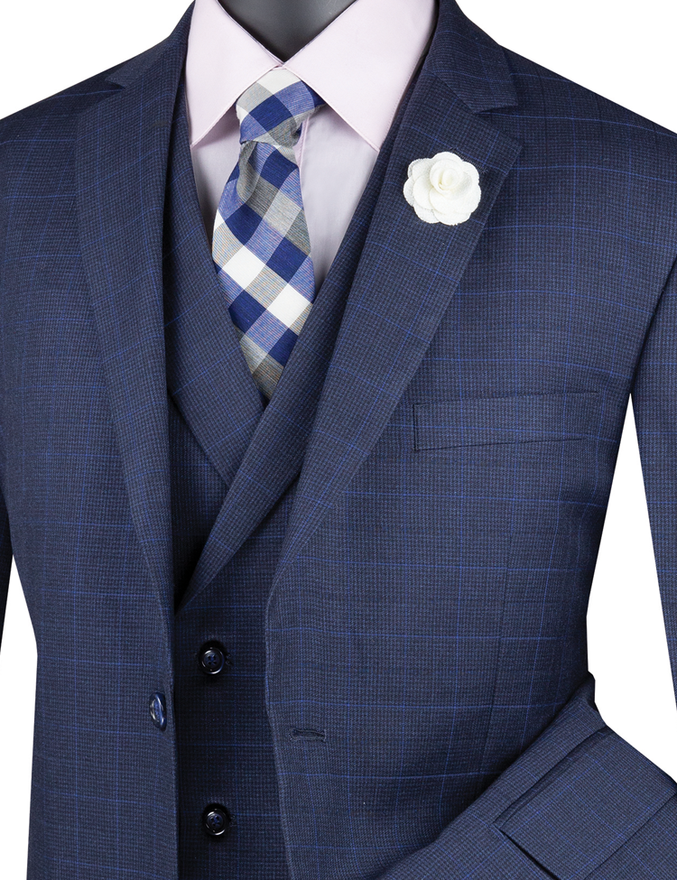 A mannequin stylishly showcases a Vinci Suits' Glen Plaid three-piece suit in navy, complete with a white lapel flower and a matching blue and white plaid tie.