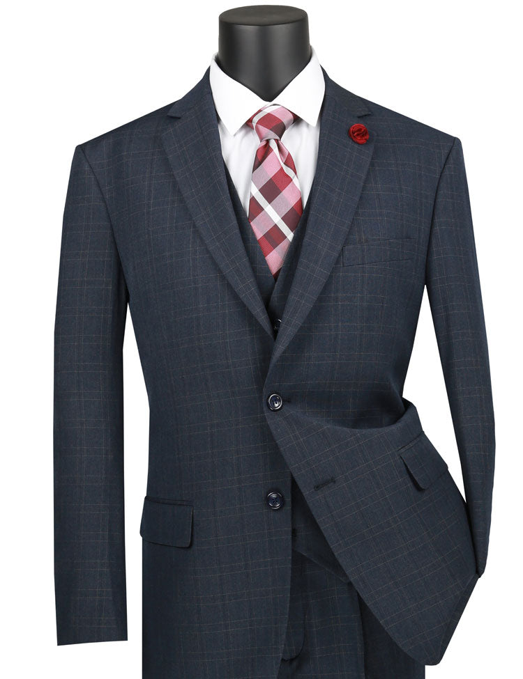The mannequin showcases a Vinci Suits Regular Fit Glen Plaid 3 Piece Suit (Blue) V2RW-15, styled with a classic white shirt and red plaid tie. A bold red lapel pin adds a touch of flair to the ensemble.