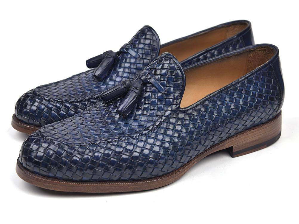 The Paul Parkman Woven Leather Tassel Loafers in Navy feature an elegant woven design with tassels adorning the front.