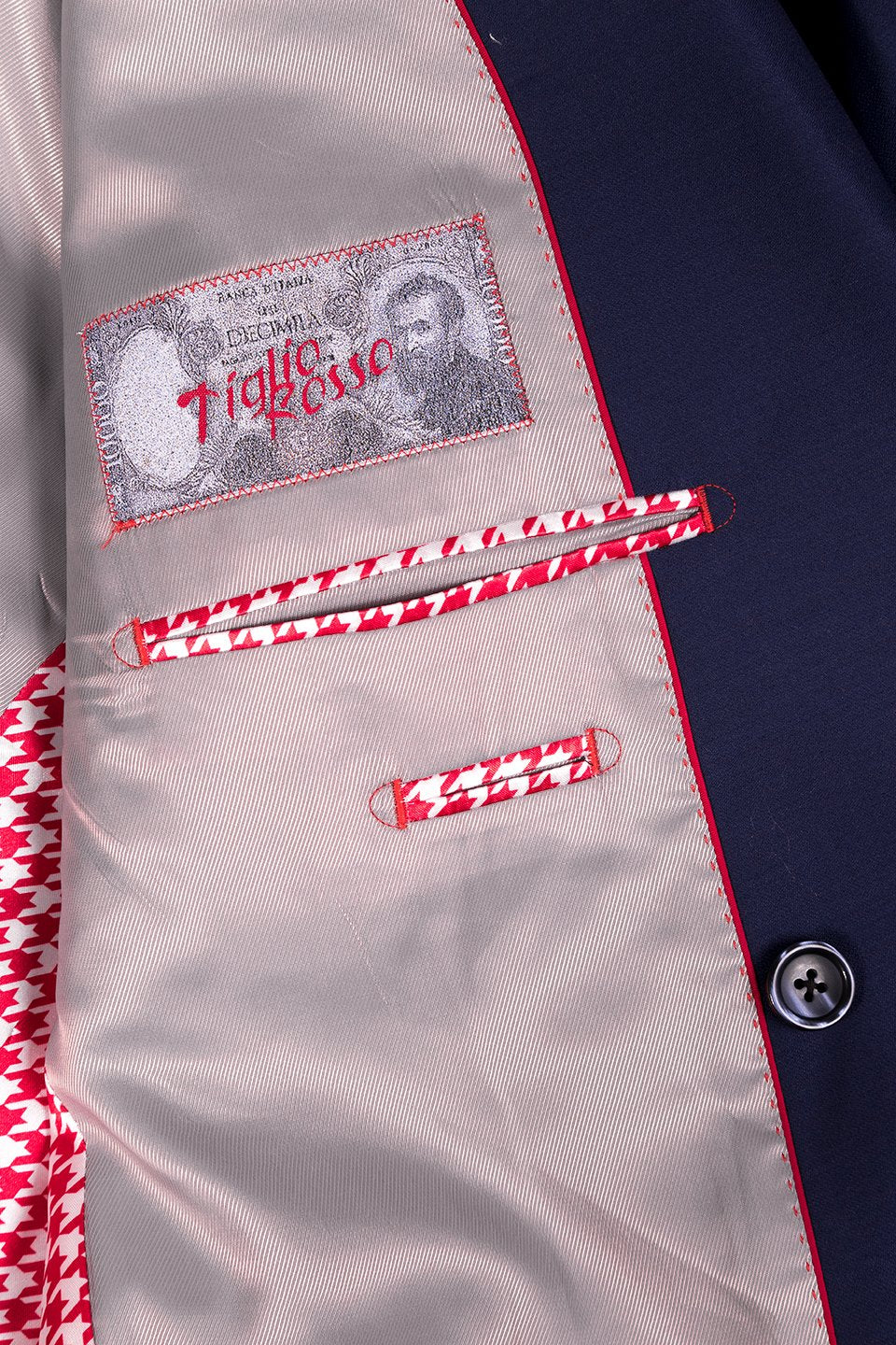 The Tiglio Rosso DB Este French Blue suit, paired with a light blue shirt, maroon tie, and patterned pocket square, exudes the sophisticated style unique to Tiglio Rosso suits.