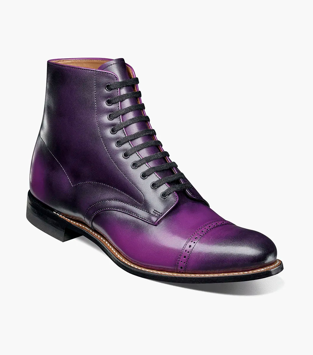 A single STACY ADAMS Madison Cap Toe Lace Up Boot in purple (00110-542) with black laces and brogue detailing is displayed on a plain white background.