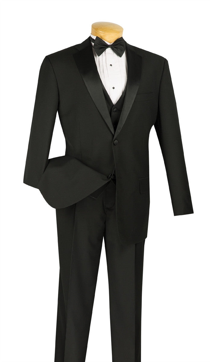 The Regular Fit 4 Piece Tuxedo with Vest Bow Tie Adjustable Waistband (Black) from Vinci Suits, displayed on a mannequin with a white shirt, embodies classic elegance.