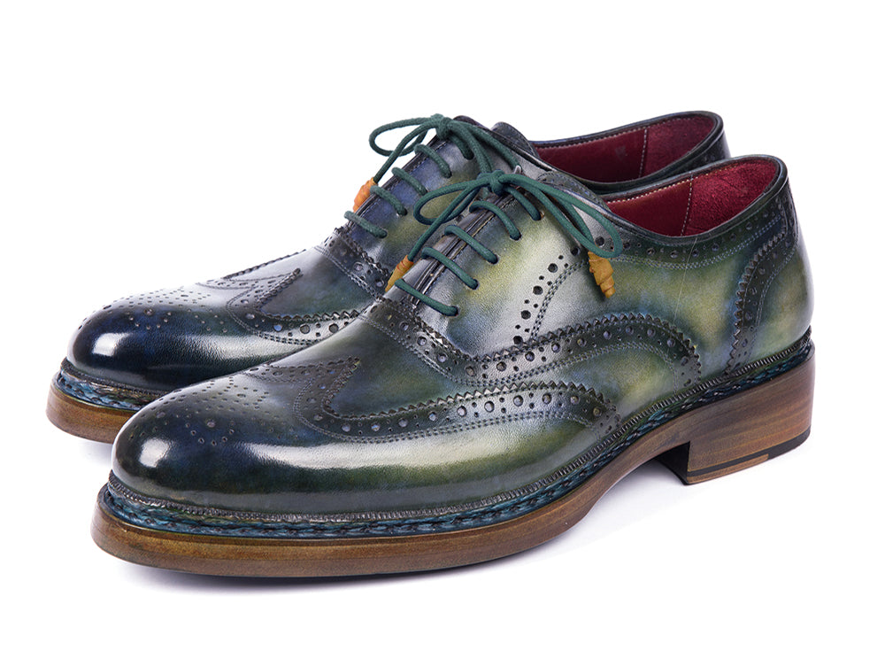 Paul Parkman Triple Leather Sole Wingtip Brogues Green & Blue feature hand-painted leather, decorative perforations, green laces, brown soles, and a red interior lining. Displayed on a white background. Brand: Paul Parkman. Model: 0225TRP-GRN.