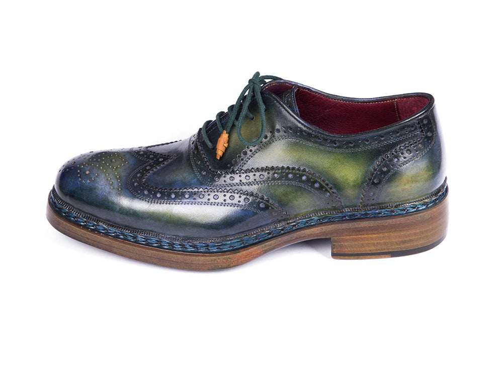 Paul Parkman Triple Leather Sole Wingtip Brogues Green & Blue feature hand-painted leather, decorative perforations, green laces, brown soles, and a red interior lining. Displayed on a white background. Brand: Paul Parkman. Model: 0225TRP-GRN.