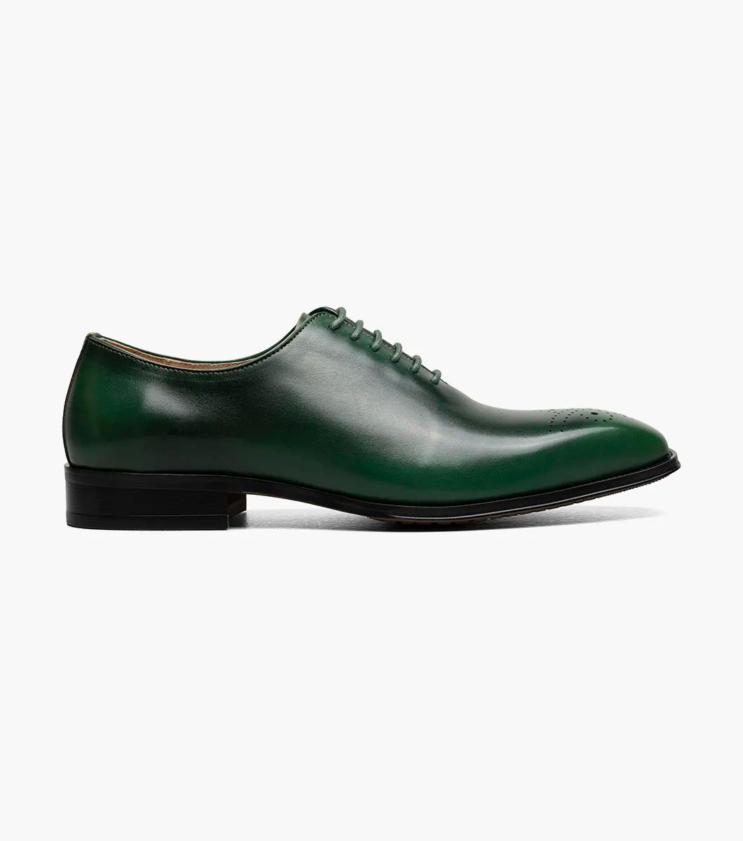 A single green STACY ADAMS Hallquist Plain Toe Oxford leather shoe (style 25742-300) with laces and decorative perforations on the toe, shown isolated on a white background.