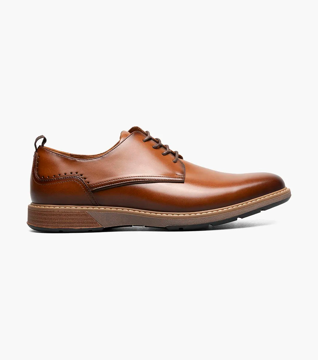 The Stacy Adams Pacer Plain Toe Oxford in Cognac (25754-221) is shown on a white background—its classic lace-up design and low heel make it ideal for both dress casual and formal occasions.