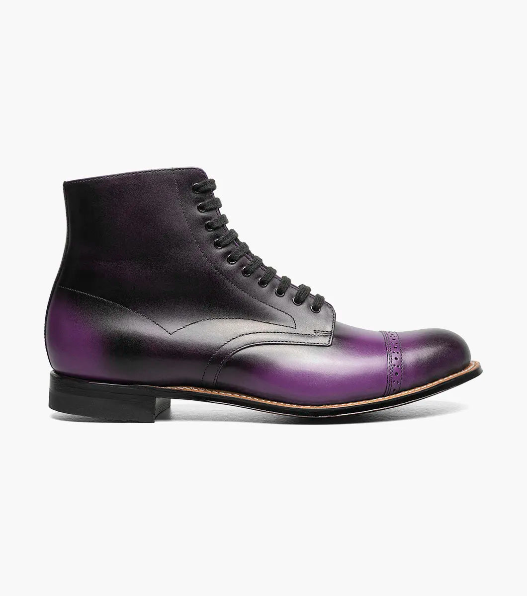 A single STACY ADAMS Madison Cap Toe Lace Up Boot in purple (00110-542) with black laces and brogue detailing is displayed on a plain white background.