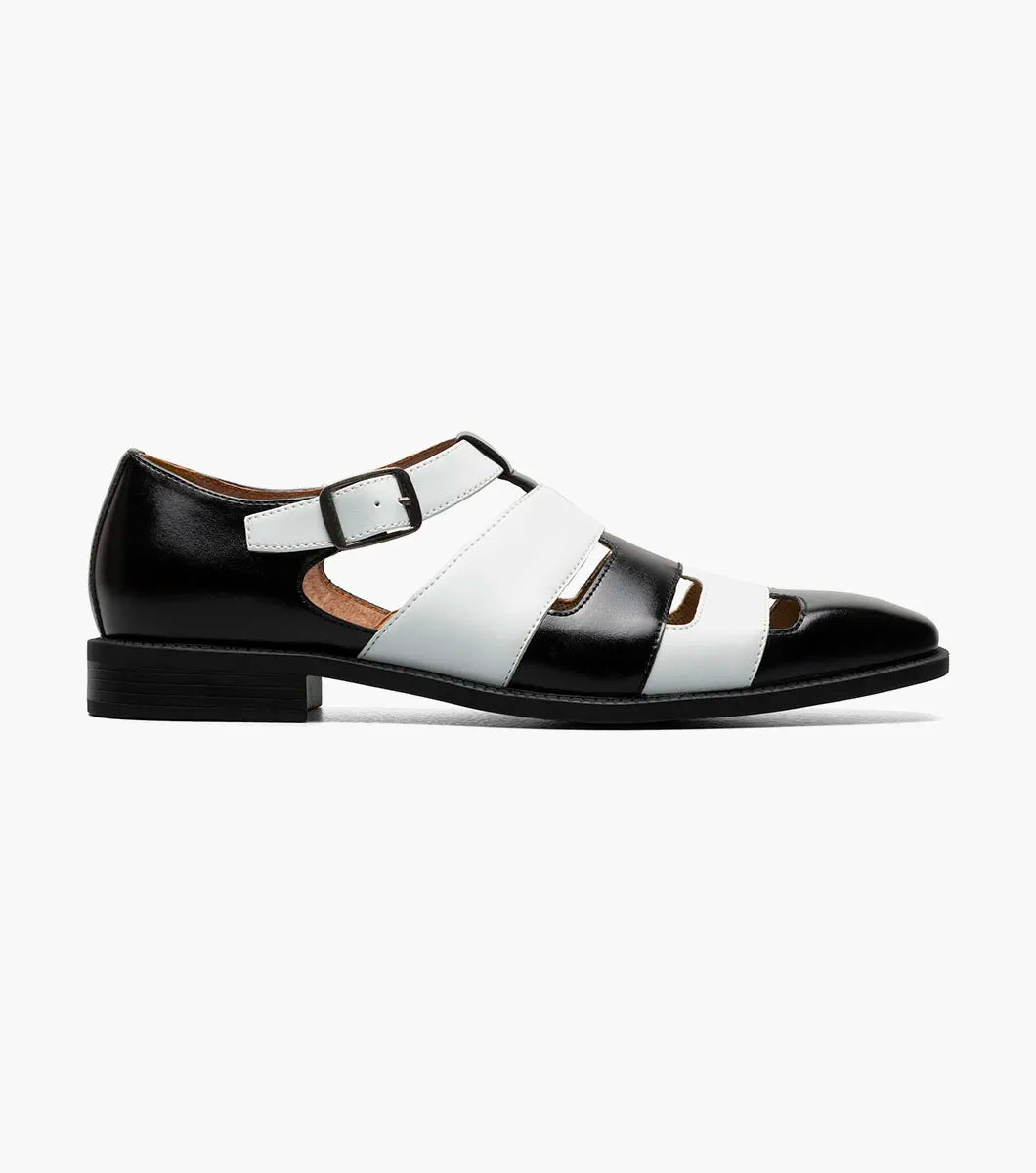 The Stacy Adams Calderon Closed Toe City Sandal (25599-111) features black and white leather, a side buckle, multiple cutout straps, cushioned insole, closed toe, and low heel for comfort and style.