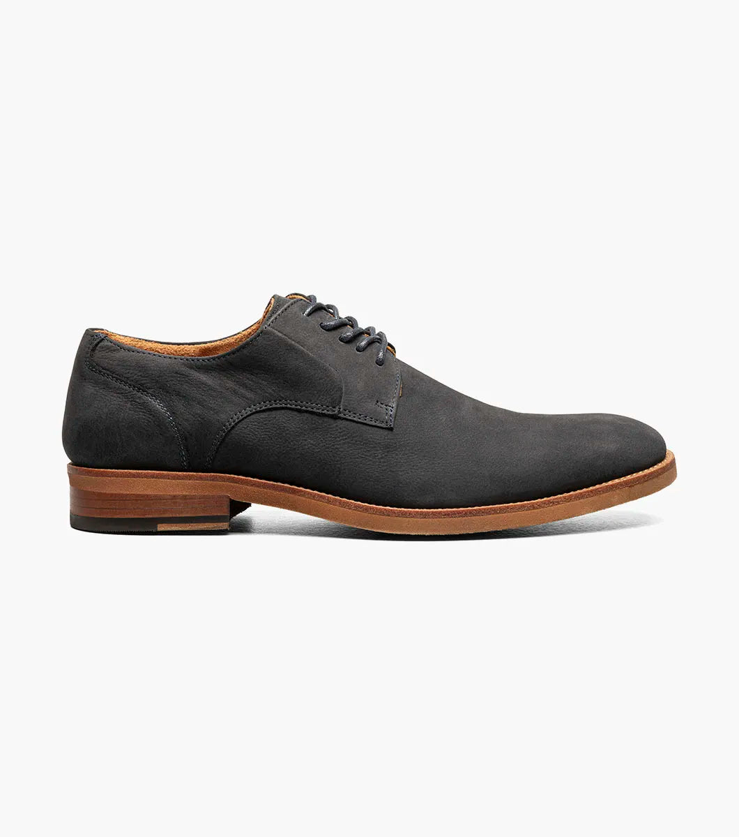 The Stacy Adams Preston Plain Toe Lace Up (Navy, 25650-410) is a single navy leather shoe with a brown sole and black laces, featuring a plain toe lace up design, shown against a white background.