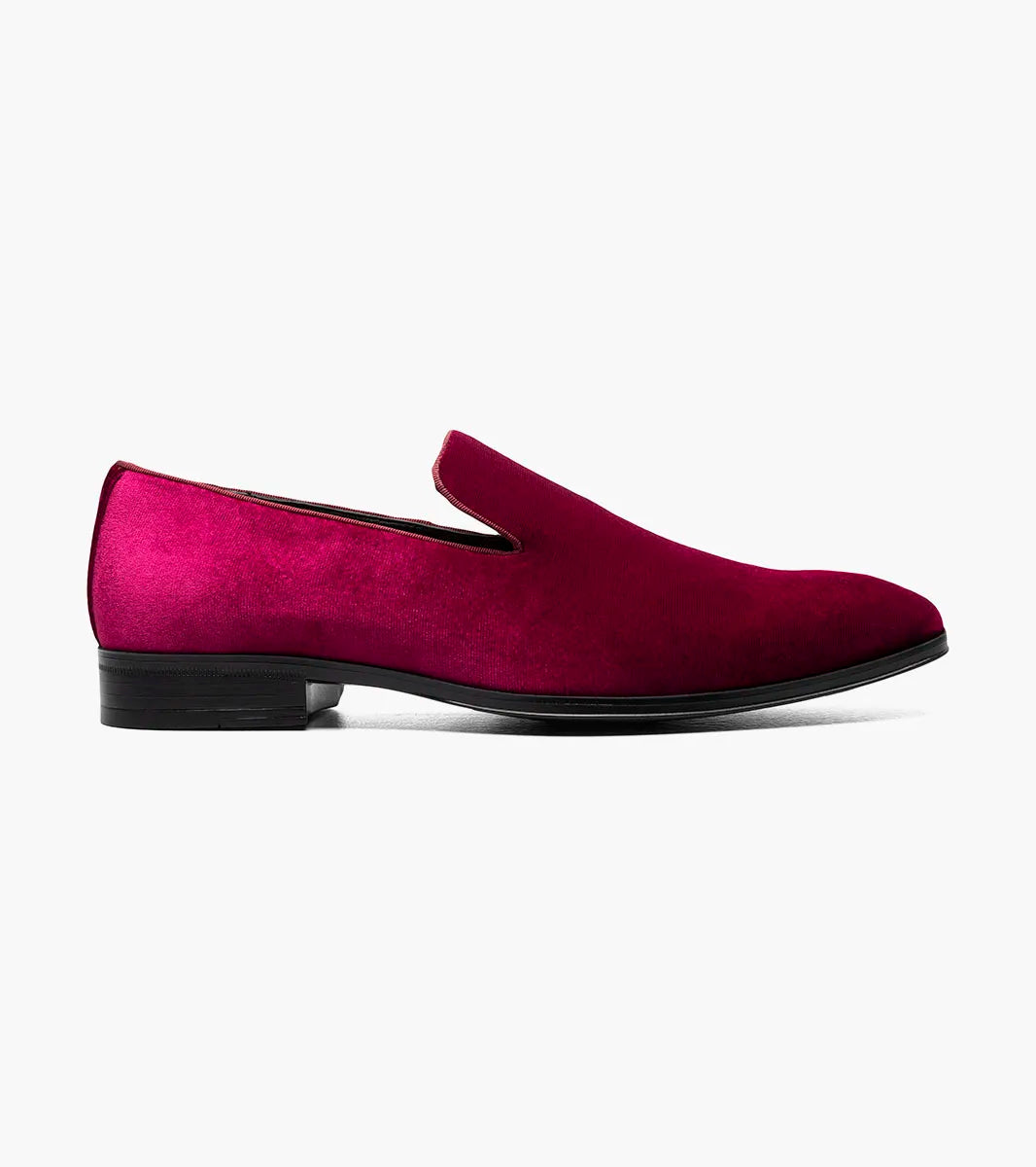 The Stacy Adams Savian Plain Toe Velour Slip On in cranberry (25613-608) features a men’s rounded toe, cushioned insole, low black heel, and sleek magenta velour design, shown on a plain white background.