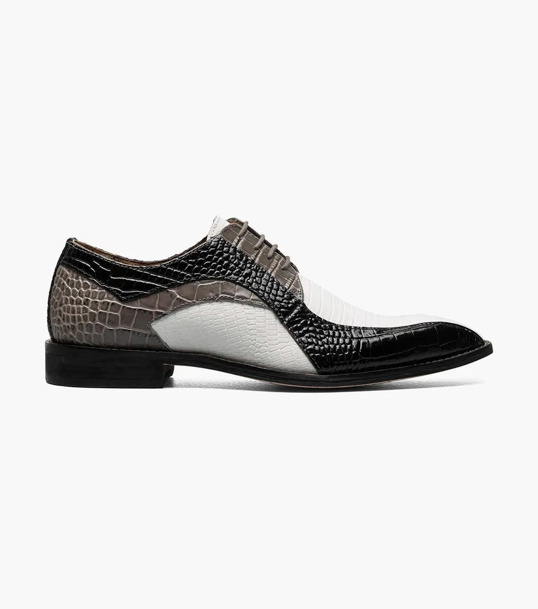 The Stacy Adams Turano Bike Toe Oxford (25576-910) is a men's dress shoe in black and grey croco print leather with white accents, featuring a low heel and lace-up closure.