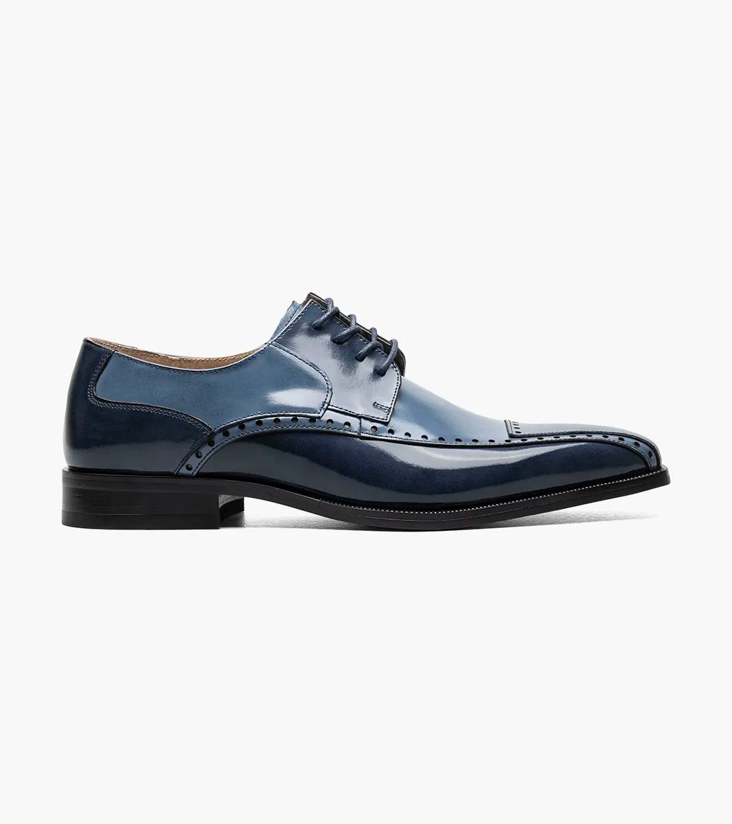 The Stacy Adams Plaza Modified Cap Toe Oxford in Blue Multi (25608-460) features decorative stitching, laces, a cushioned insole, and a low black heel, shown as a single shoe on a white background.