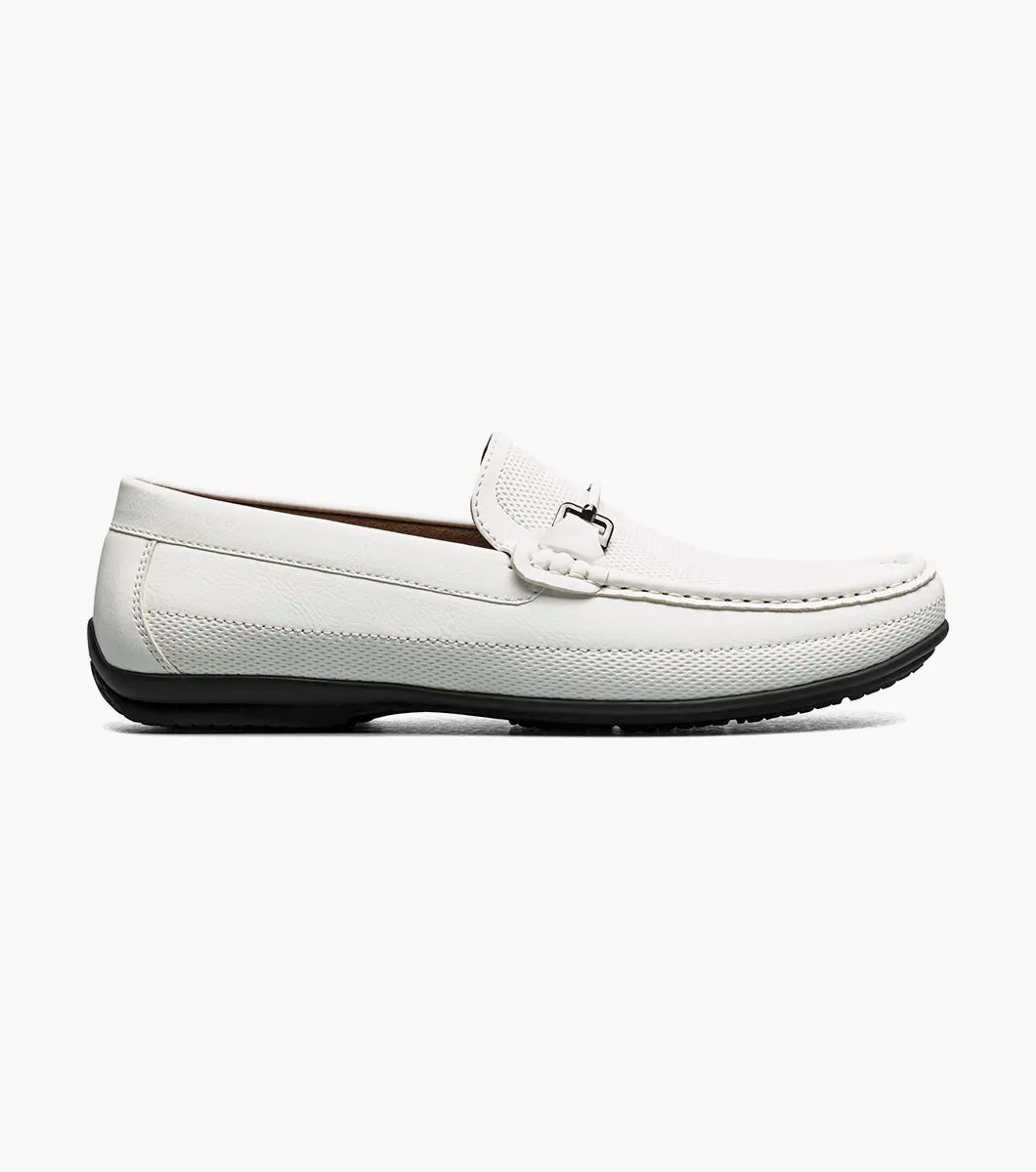 The STACY ADAMS Colton Moc Toe Bit Slip On (White, 25760-100) is a men's leather loafer with a silver bit detail, black sole, patterned heel lining, and cushioned footbed for all-day comfort.