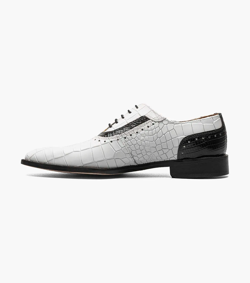 The STACY ADAMS Riccardi Plain Toe Oxford (Black w/White, 25575-111) features a croco lizard print leather texture, black accents on the sides and toe, and black laces, shown on a plain background.