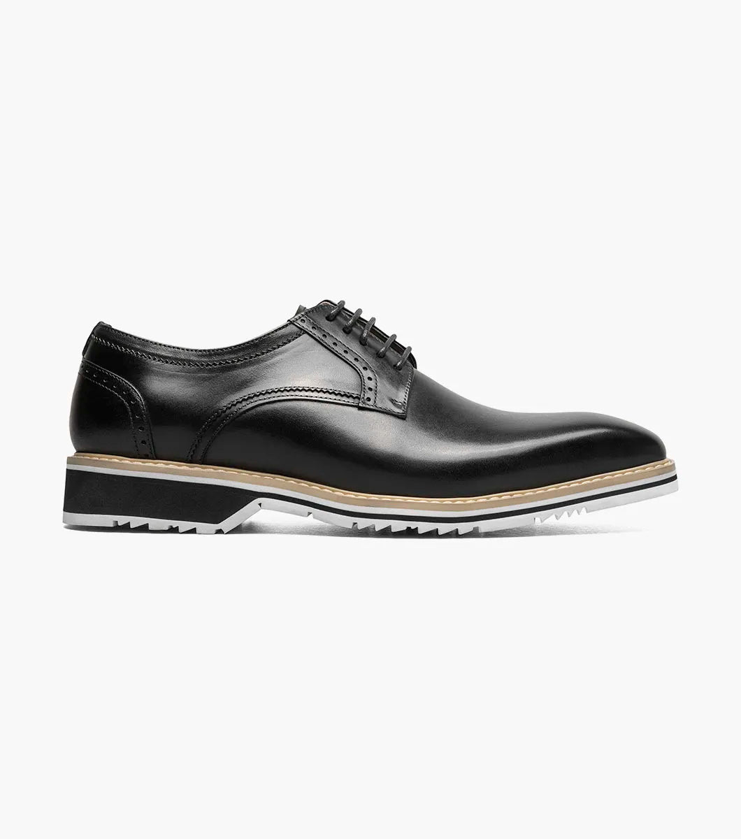 The Stacy Adams Barringer Plain Toe Oxford (Black, 25722-001) features lace-up leather with subtle crocodile print, tan trim, and a white and black rubber sole, shown in a side view on a plain white background.