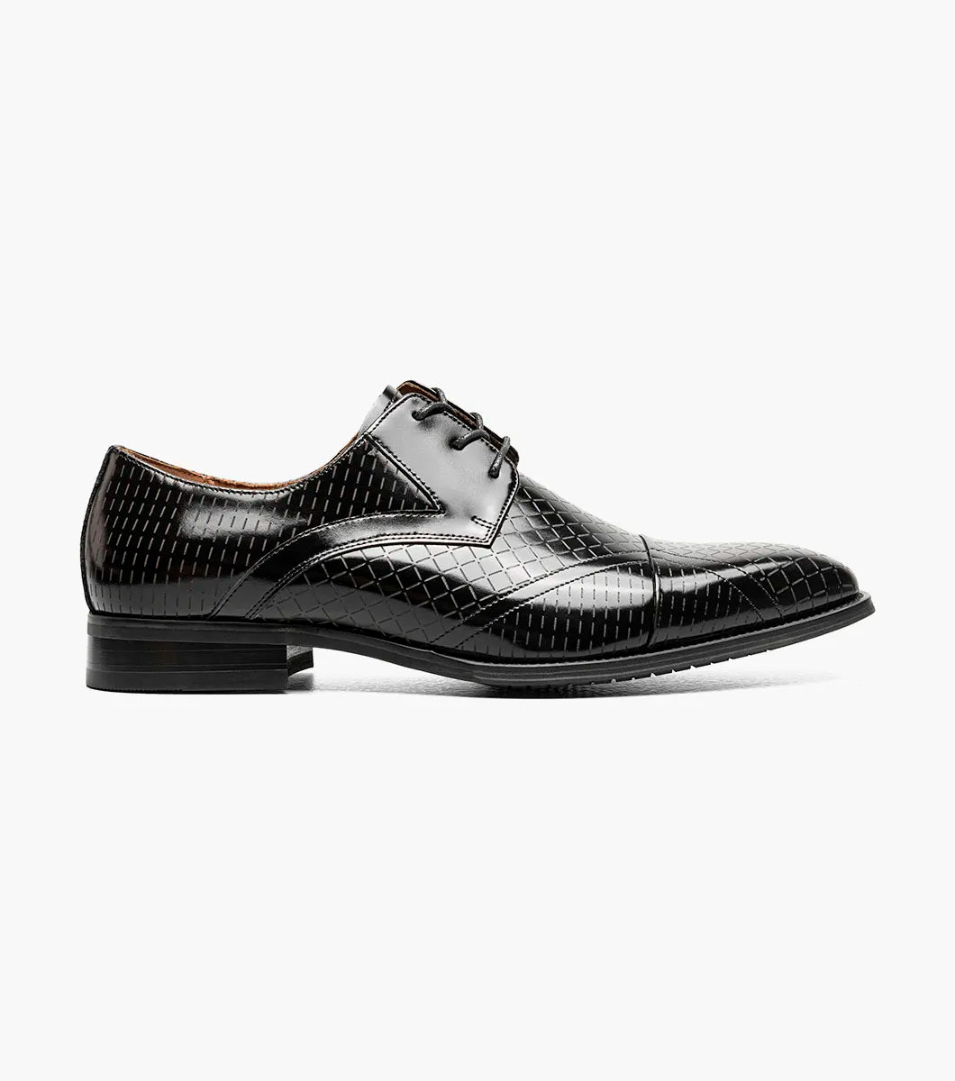 The Stacy Adams Hobson Cap Toe Oxford (25764-001) is a single black dress shoe with shiny, laser-etched geometric leather and black laces, displayed on a plain white background.
