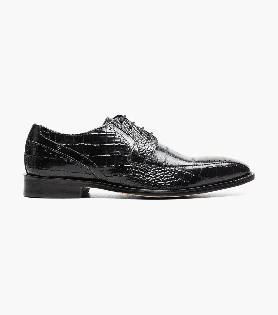 The Stacy Adams Talamanco Bike Toe Oxford in black (style 25788-001) features crocodile print leather with brogue detailing on the toe, a RedZone footbed for added comfort, and black laces, shown against a white background.