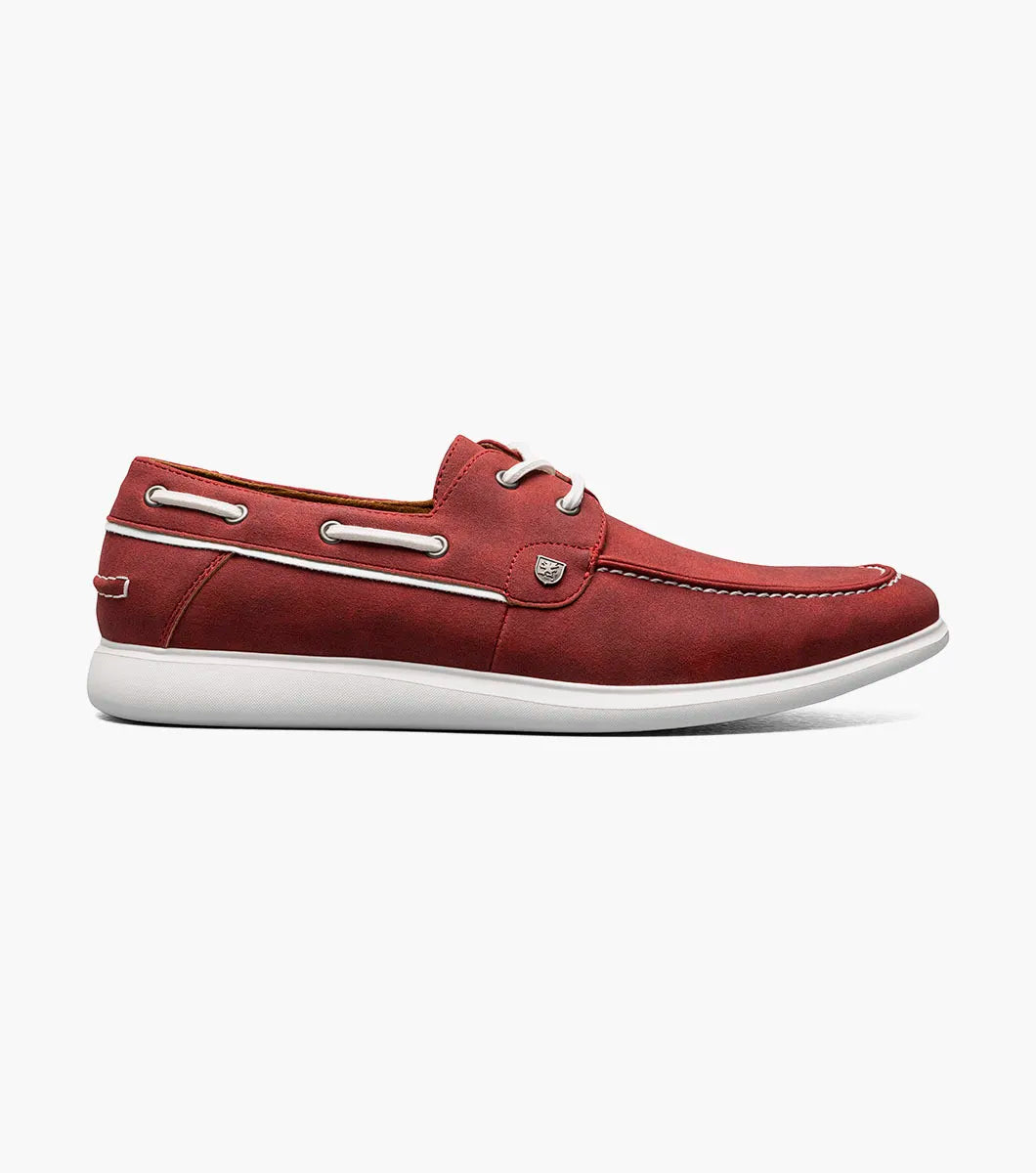 The STACY ADAMS Reid Moc Toe Lace Up (Red, 25592-600) is a red boat shoe with white stitching, laces, and sole, plus a memory foam footbed for comfort. Displayed on a plain white background.
