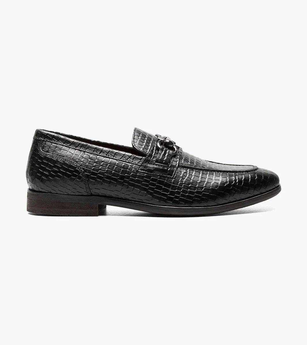 The STACY ADAMS Feronte Moc Toe Bit Slip On (25623-001) features black crocodile print leather with a snakeskin texture and a silver bit detail, shown on a white background.