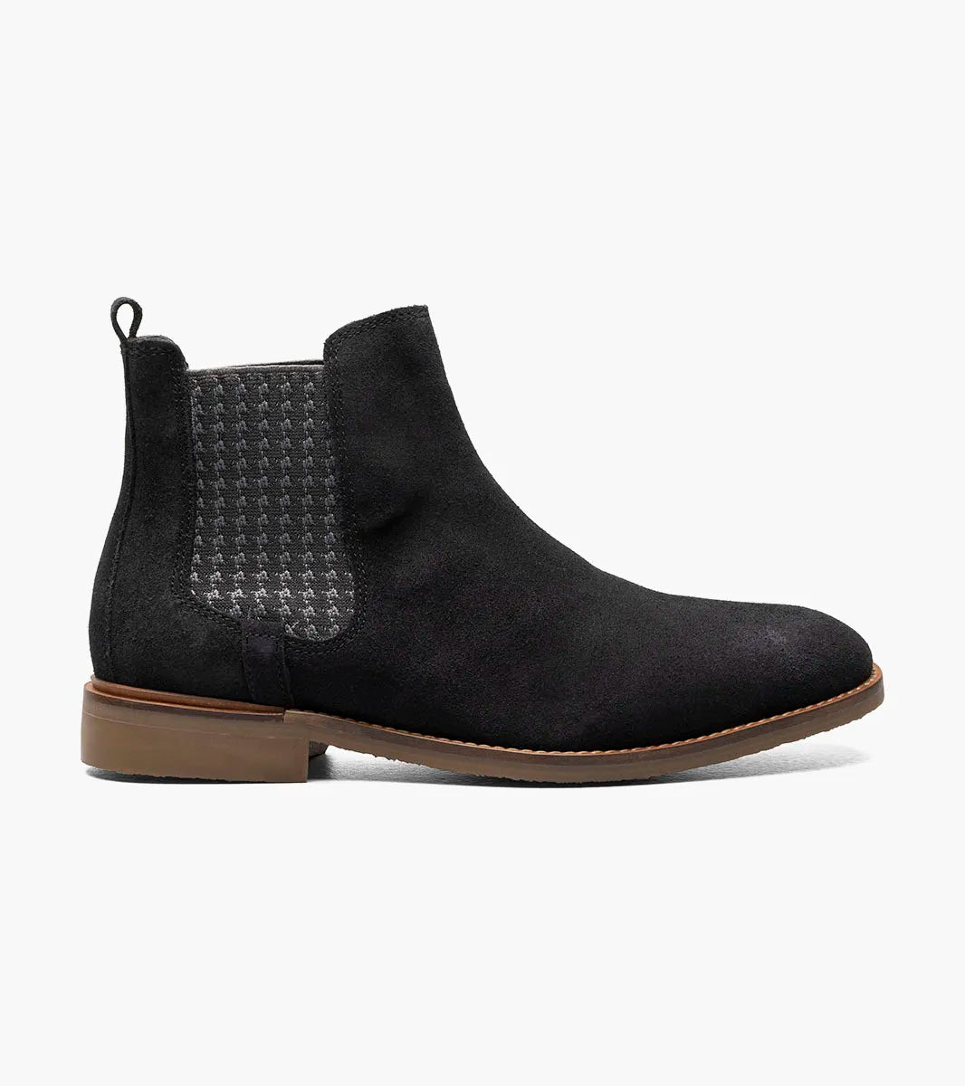 The Stacy Adams Gabriel Plain Toe Chelsea Boot (25625-008) features a black suede upper, brown sole, houndstooth side panel, elastic gusset, and rear pull tab.