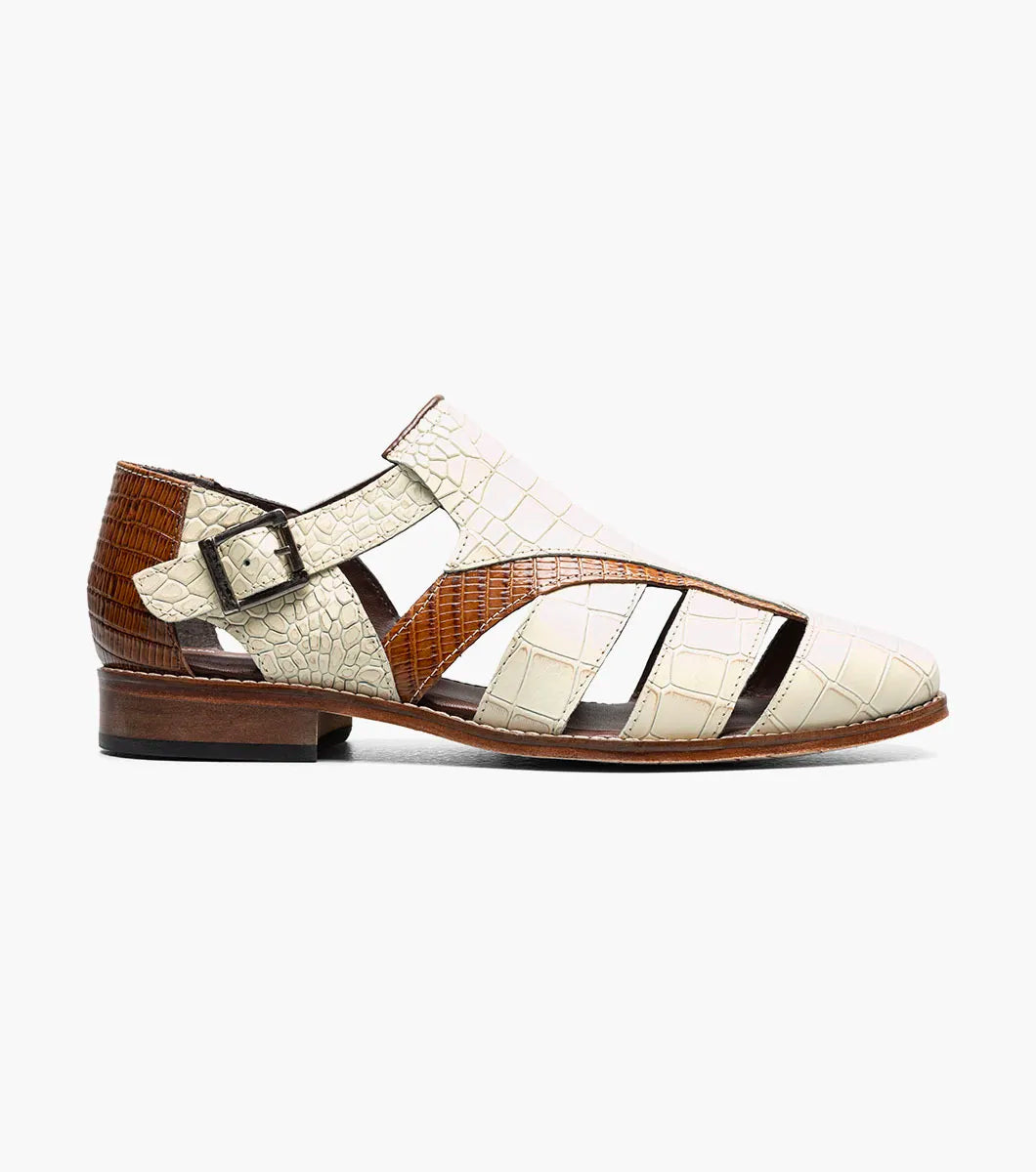 The Stacy Adams Calandro City Sandal in Ivory Multi (25695-114) features crocodile print leather, cream and brown color, closed toe, side buckle, cut-out details, cushioned footbed, and low heel.